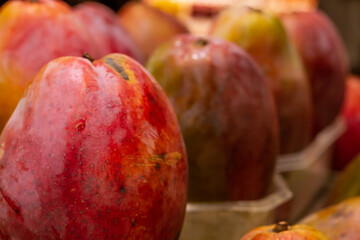 Fototapeta na wymiar Mango in macro close-up at a market in Thailand.