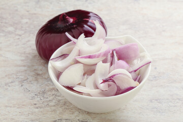 Sliced red onion in the bowl