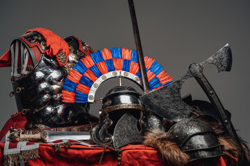 Armor and weapons of scandinavian warrior and roman soldier