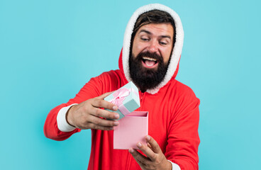 just have fun. happy bearded mature man in santa claus costume. new year party. celebrate winter holidays. merry christmas to you. xmas shopping time. prepare gifts and presents. Wishing a happy Year