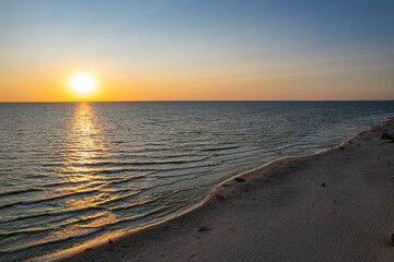 Obraz premium Aerial summer sunset view of sunny resort Palanga, Lithuania. Baltic sea, Palanga Bridge - Pier