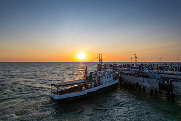Aerial summer sunset view of sunny resort Palanga, Lithuania. Baltic sea, Palanga Bridge - Pier