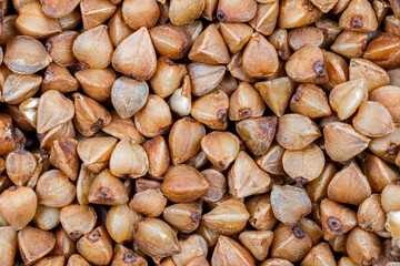 background of close up of buckwheat groats.