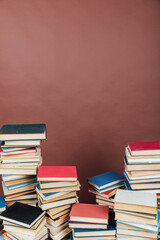 lots of books to study in the university library on a brown background