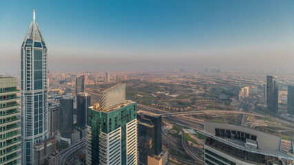 Panorama of Dubai Marina with JLT skyscrapers and golf course timelapse, Dubai, United Arab Emirates.