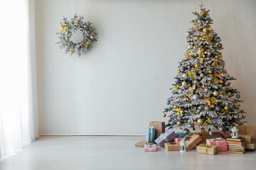 white christmas tree with gifts decoration for the new year
