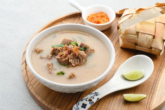 Coto Makassar, traditional food from Makassar, South Sulawesi. made from beef offal mixed with beef, seasoned with specially formulated spices. Usually served with Burasa or Ketupat ( rice cake ).
