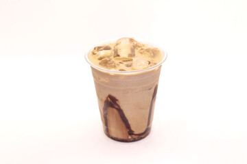 Iced mocha latte served in a plastic disposable cup for take away.