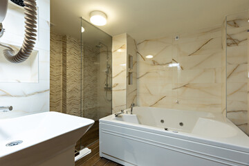 Interior of a luxury bathroom with hydromassage bathtub