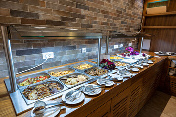 Lunch on a buffet table in the restaurant