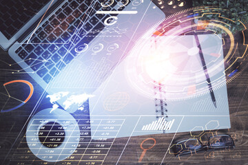 Multi exposure of data theme drawing hologram over topview work desk background with computer. Concept of technology.