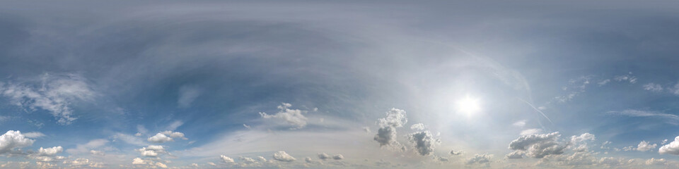 blue sky hdri 360 panorama with halo and haze in beautiful clouds in seamless projection with...