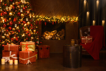 Photo of a Christmas tree on the background of a fireplace in a festive interior. There are packed gifts under the tree.
