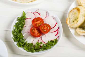 fried eggs, baguette with herb butter and coffee