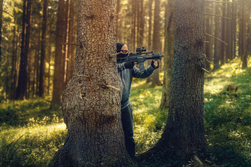 Airsoft soldier in the nature.