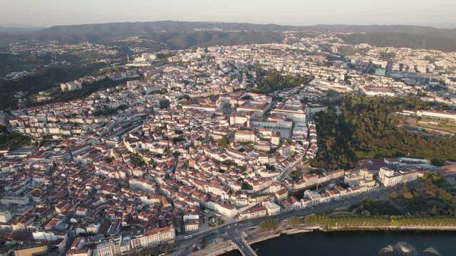 Panoramic view of Coimbra sprawling cityscape with University on top of the hill.