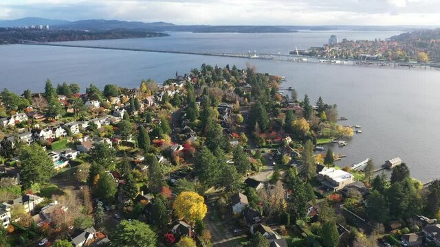 Cinematic 4K aerial drone dolly footage of Laurelhurst with Medina, WA 520, Lake Washington and Mercer Island in the distance