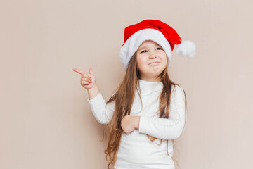 girl, child, christmas, santa hat, santa claus, holiday, tradition, funny, cap, childhood, beautiful, beauty, caucasian, celebration, banner, background, cheerful, adorable, claus, cute, december, dec