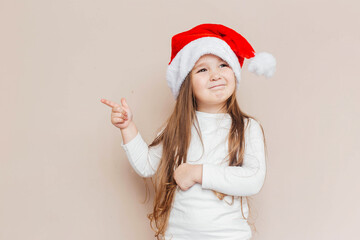 girl, child, christmas, santa hat, santa claus, holiday, tradition, funny, cap, childhood, beautiful, beauty, caucasian, celebration, banner, background, cheerful, adorable, claus, cute, december, dec