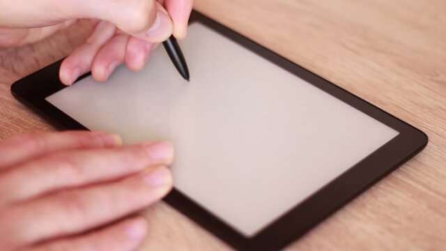 Writing VIRUS on Electronic tablet
