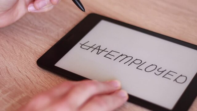 Inscription UNEMPLOYED on Electronic tablet