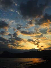 AT THE JUNCTION OF THE MOUNTAINS AND THE SEA