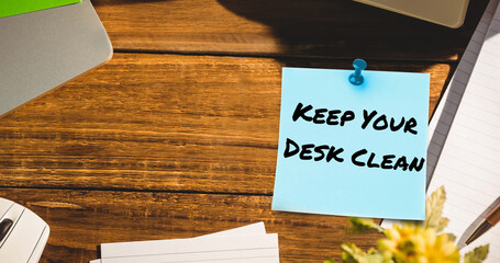 Image of keep your desk clean text on memo note on desk
