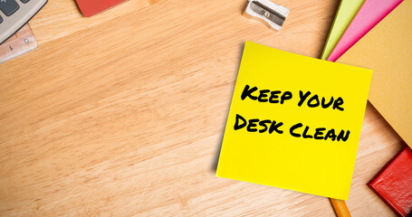 Image of keep your desk clean text on memo note on desk