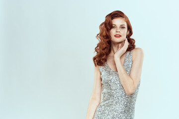 woman in silver dress fashionable hairstyle decoration Glamor posing