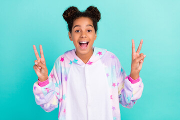 Photo of model african american awake stylish trendy girl v-sign sleepwear childhood pajama...