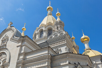 Fototapeta na wymiar Domes of the Cathedral of the Intercession of the Most Holy Theotokos on Bolshaya Morskaya street in the city of Sevastopol, Crimea
