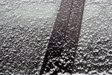Snow on car window.