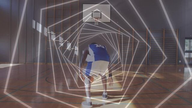 Animation of spinning hexagons over basketball player with ball