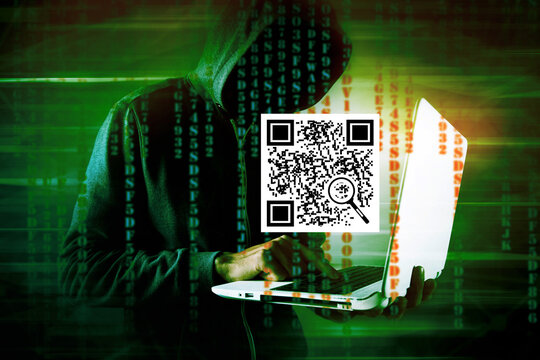 QR code and hacker with laptop