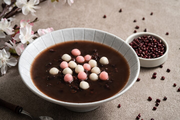 Red and white tangyuan with red bean soup.