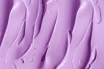 Purple clay (alginate face mask, body wrap, hair shampoo, conditioner) texture close up, selective...