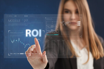 Business, Technology, Internet and network concept. Young businessman working on a virtual screen of the future and sees the inscription: ROI