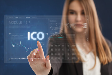 Business, Technology, Internet and network concept. Young businessman working on a virtual screen of the future and sees the inscription: ICO