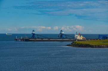 bulk ship loading at coal terminal in Vanino harbor (Khabarovsky krai, Russia)