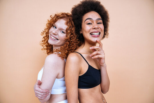 beauty image with two young women with different skin and body