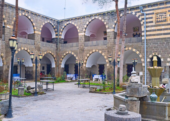 The courtyard of medieval Deliller Hani caravanserai in Diyarbakir, Turkey