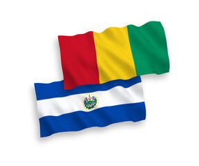 Flags of Republic of El Salvador and Guinea on a white background