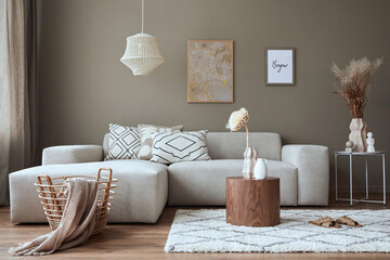 Interior design of stylish living room with modern neutral sofa, mock up poster farmes, dried...