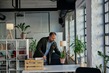 Man return to work and setting office table