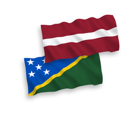 Flags of Latvia and Solomon Islands on a white background