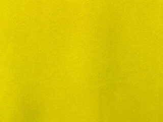 Yellow velvet fabric texture used as background. Empty yellow fabric background of soft and smooth textile material. There is space for text..	
