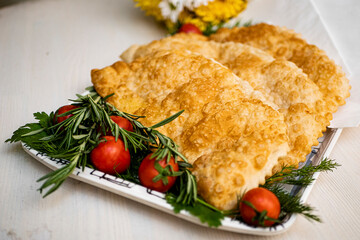 Juicy pasties with meat with a golden crust