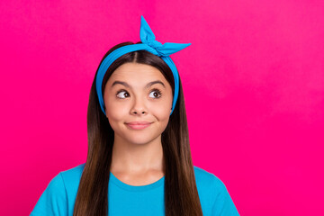 Portrait of attractive curious cheerful long-haired girl thinking copy space isolated over bright pink magenta color background