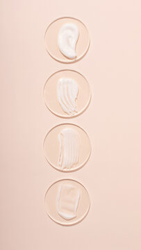 Top view of the cosmetic cream on the acrylic podiums,different swatches.Pastel colors,copy space.Good as cosmetics mockup.Vertical photography.