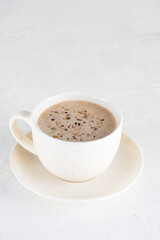 Nutty mochaccino coffee in a mug.